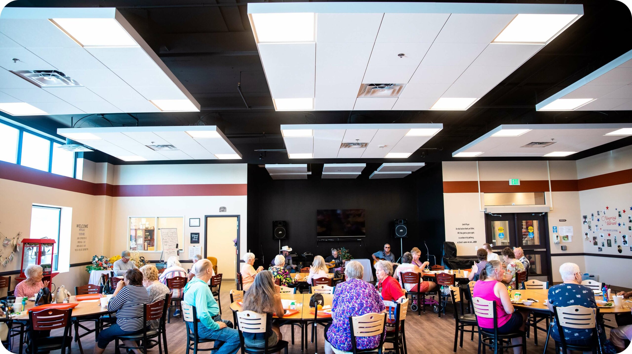 Image of adult seniors sitting together in a auditorium