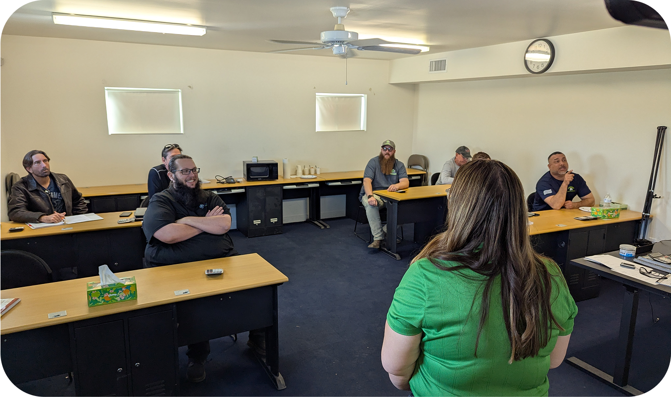 A female instructing a class